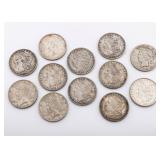 12 SILVER DOLLARS