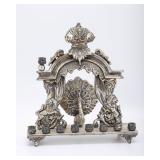 A SILVERPLATED PEACOCK FORM HANUKKAH LAMP. Austria, c. 1900