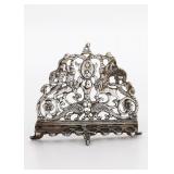 A MINIATURE SILVER HANUKKAH LAMP. Probably Dutch, 1920s. In the shape of an early Italian model. 3.2