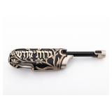 A STERLING SILVER CANDLE LIGHTER.