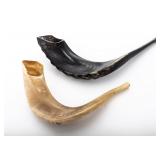 TWO VINTAGE HAND CARVED SHOFARS.