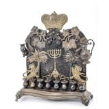 A BRASS HANUKKAH LAMP. Warsaw, c. 1880.