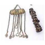 AN AMULET HOLDER AND A MEZUZAH CASE