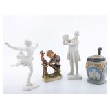 A BEER STEIN WITH A SIX POINTED STAR AND OTHER FIGURINES