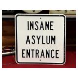 Embossed Insane Asylum Sign