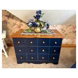 Small Chest and Floral Arrangement