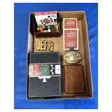 Flat of Playing Cards and Belt Buckle