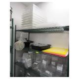 GREEN WIRE RACK WITH CONTENTS