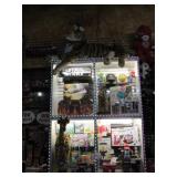REDEMPTIONS IN MIDDLE DISPLAY CABINET OF BACK WALL