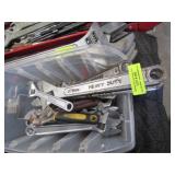 Bin of Adjustable Wrenches