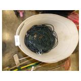 BARREL WITH LOTS OF EXTENSION CORDS