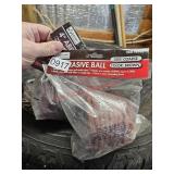 Two 4" abrasive balls - garage
