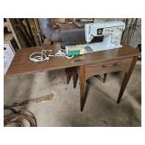 Vintage Singer sewing machine with fold away