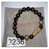 Lucky Buddha Bracelet (dining room)