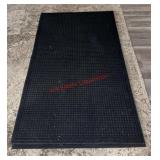 heavy-duty black entrance or utility mat (dinning