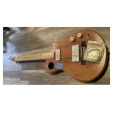 custom-made electric guitar headstock with a