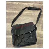 Prada black nylon messenger bag. (Dinning room)