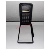 Little notepad Pen and Calculator       (hallway)