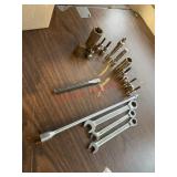 mechanics' tools, wrenches, sockets, and a