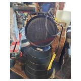 Honeywell heater and Ikea trash can - garage