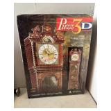 3D Clock Puzzle in box         (Back Room)