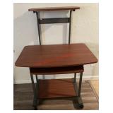 rolling computer desk with a slide-out keyboard