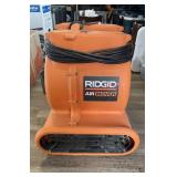 Orange Ridgid air mover (back house)