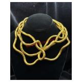 two Poseable Gold Toned Necklaces