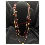 TWO Long Beaded Necklaces     (Jewelry)