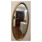 vintage-style oval wall mirror (Downstairs