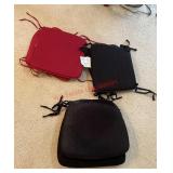 Chair cushions lot -3 reds 2black and 2 black