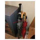 3 umbrellas and 2 canes - canning room