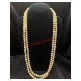 Extra long Strang of Faux Pearls with Tags