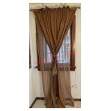 Brown curtains set with hardware pick up after