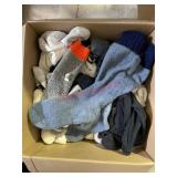LARGE LOT OF SOCKS AND CLOTHES (ROW C)