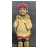 C. Alan Johnson Inuit boy figurine. (ROW C)