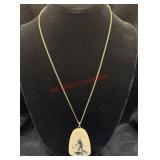 Alaskan scrimshaw pendant