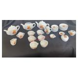 vintage miniature tea set With wicker panic