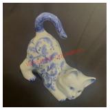 vintage porcelain cat-shaped coin bank created by