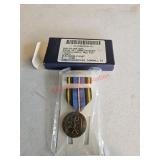 Military medal and barBox truck