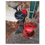 vintage cream separator used as yard art   (Rigth