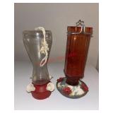 Two Hummingbird Feeders           (Garage under