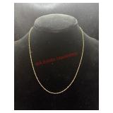 Dainty gold cha marked 14k.    (Jewelry garage)