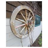 Large Wood wagon wheel used as yard art ( Garden