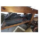 All items under the gardening tables. See photos