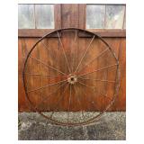 XL Wagon Wheel Metal Used as Decor       (outside