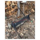 Tow-behind lawn aerator                  (BACK