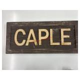 Wooden sign (garage side room)