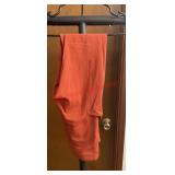 One pair of orange Lululemon leggings unknown