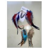 Feather earrings lot (master bedroom)